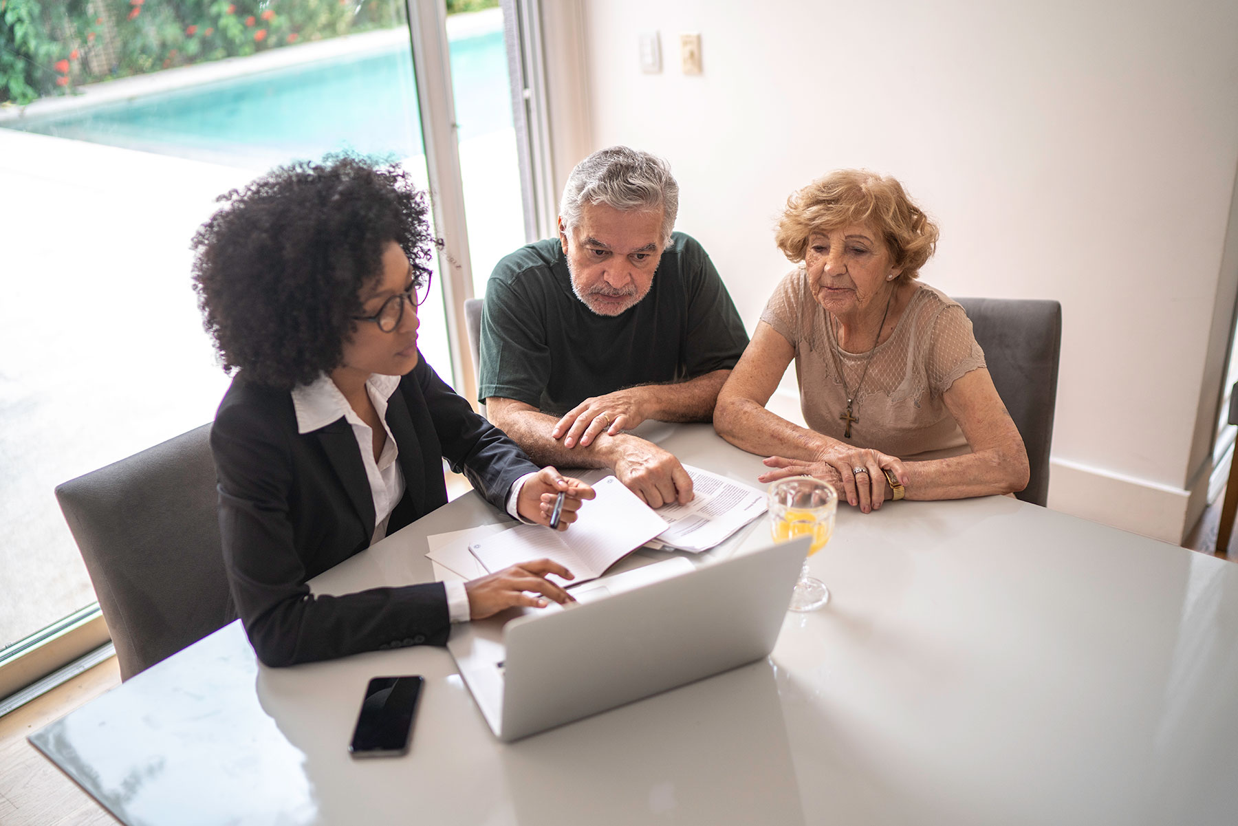 Senior Couple Looking at Laptop