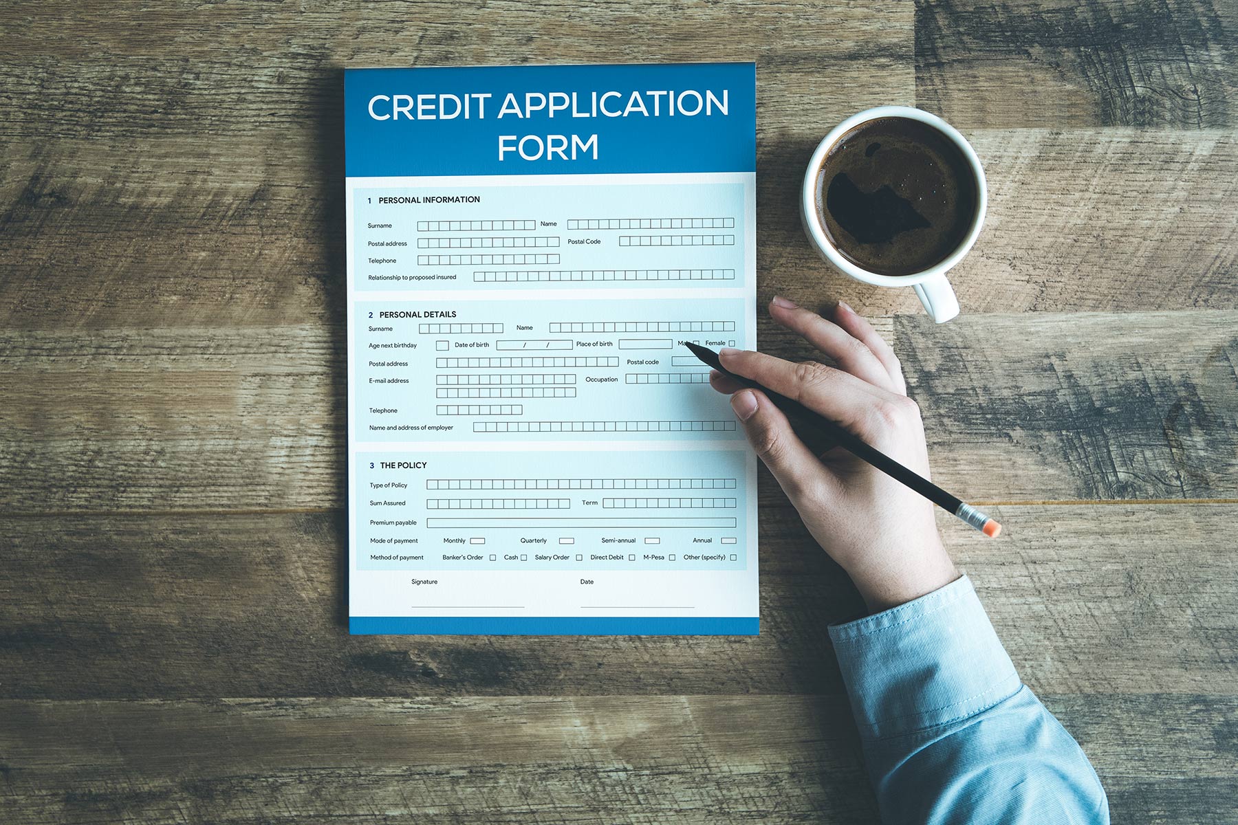 credit form application with coffee cup