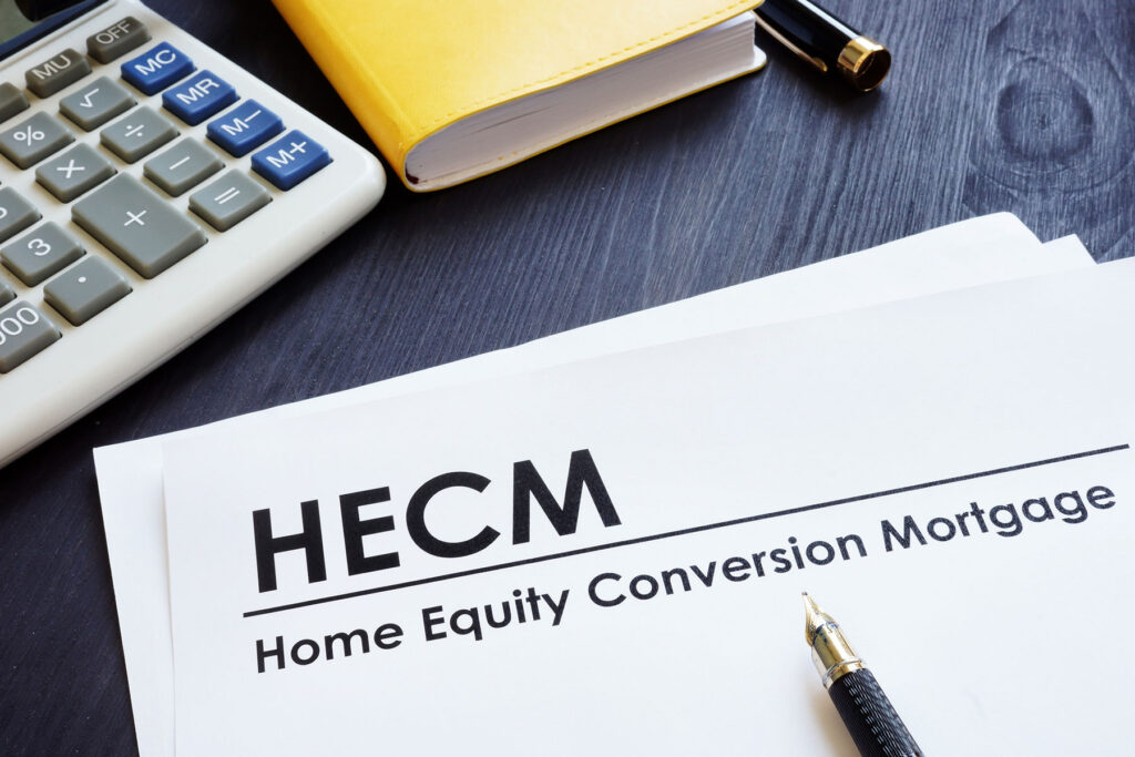 HECM paperwork with calculator