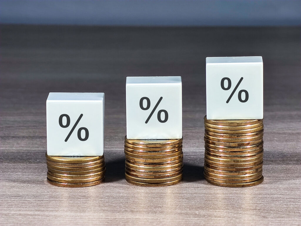 percentage boxes sitting on top of coins